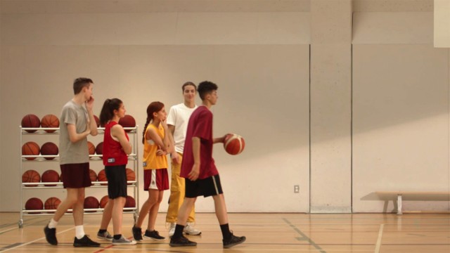 A boy makes a shot in the publicity Basketball from YMCA, directed by JF Sauvé at Alt productions